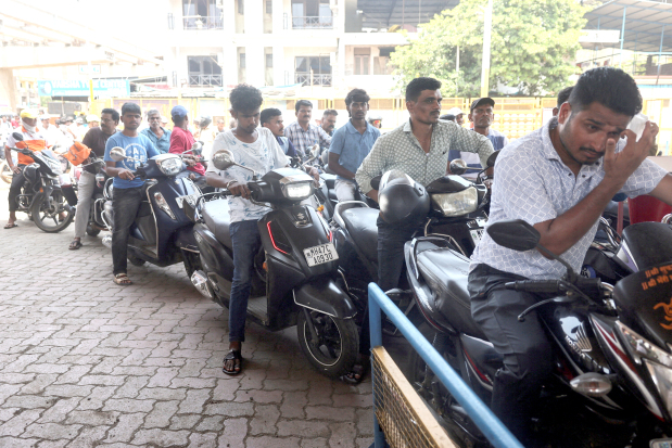 India raises retail fuel prices